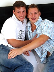 Two guys coupling on the whitness bed