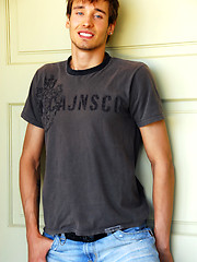 Pretty blue-eyed stud takes off his jeans and shirt