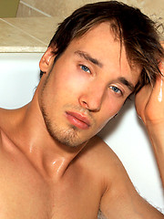 Pretty blue-eyed stud takes off his jeans and shirt