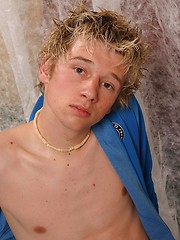 Blonde twink getting naked and showing uncut dick