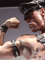 Hot muscled hunks in leather clothes in one hardcore scene