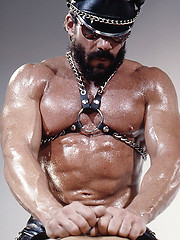 Hot muscled hunks in leather clothes in one hardcore scene