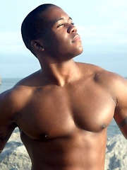Young black stud demonstrates his athletic body