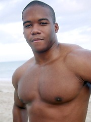 Young black stud demonstrates his athletic body