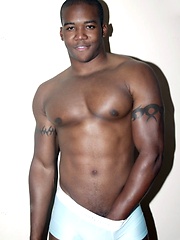 Young black stud demonstrates his athletic body