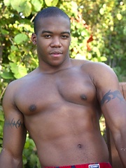 Young black stud demonstrates his athletic body