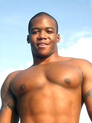Young black stud demonstrates his athletic body