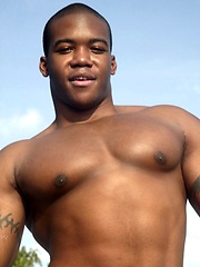 Young black stud demonstrates his athletic body