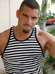 Well-hung latin man jerking long cock