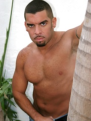 Well-hung latin man jerking long cock