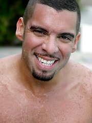 Well-hung latin man jerking long cock