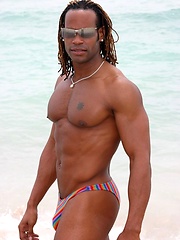 Muscled black man jacking off his big cock