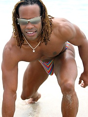 Muscled black man jacking off his big cock