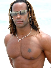 Muscled black man jacking off his big cock