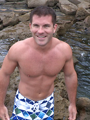 Beefy, a little hairy, and a cute smile on his face