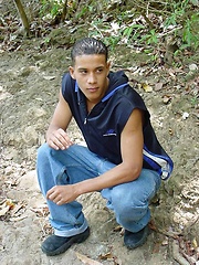 Handsome latin twink strips and poses outdoors