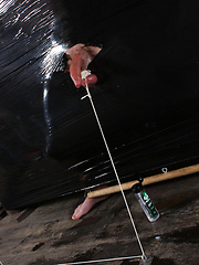 Sexy Max Brown wears black plastic