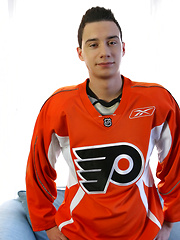 Hockey boy Jimmy Bodine and his big curved stick
