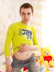 Timmy is having fun on camera with teddy bear