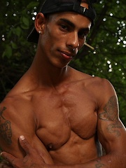 Bronzed guy shows his beefy body