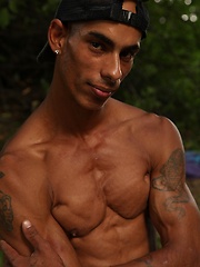 Bronzed guy shows his beefy body