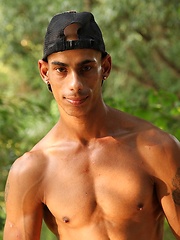 Bronzed guy shows his beefy body