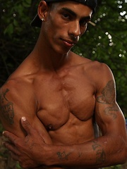 Bronzed guy shows his beefy body