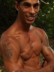 Bronzed guy shows his beefy body