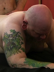 Shaved heads, tats, piercings, long facial hair, this has it all