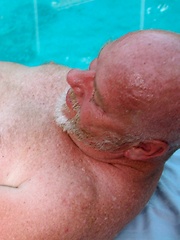 After a hard fuck these bears can relax by the pool