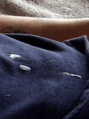 Jacob Pike sitting in the coach and stroking cock