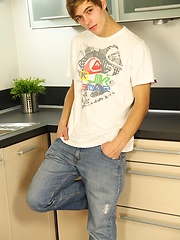 Gorgeous Mario Richy strokes uncut dick in the kitchen.