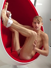 Cute blond Constantine blows huge load over his stomach.